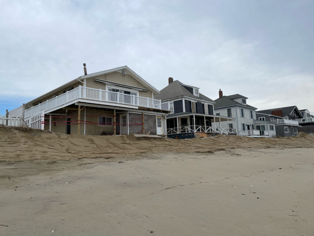 a row of houses on a beach (MyCoast AI)