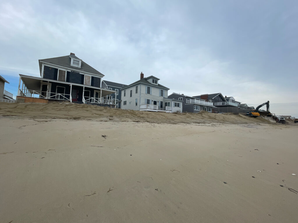 a row of houses on a beach (MyCoast AI)