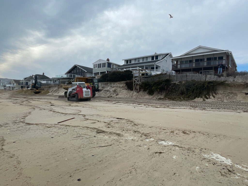 a beach with houses and a car (MyCoast AI)