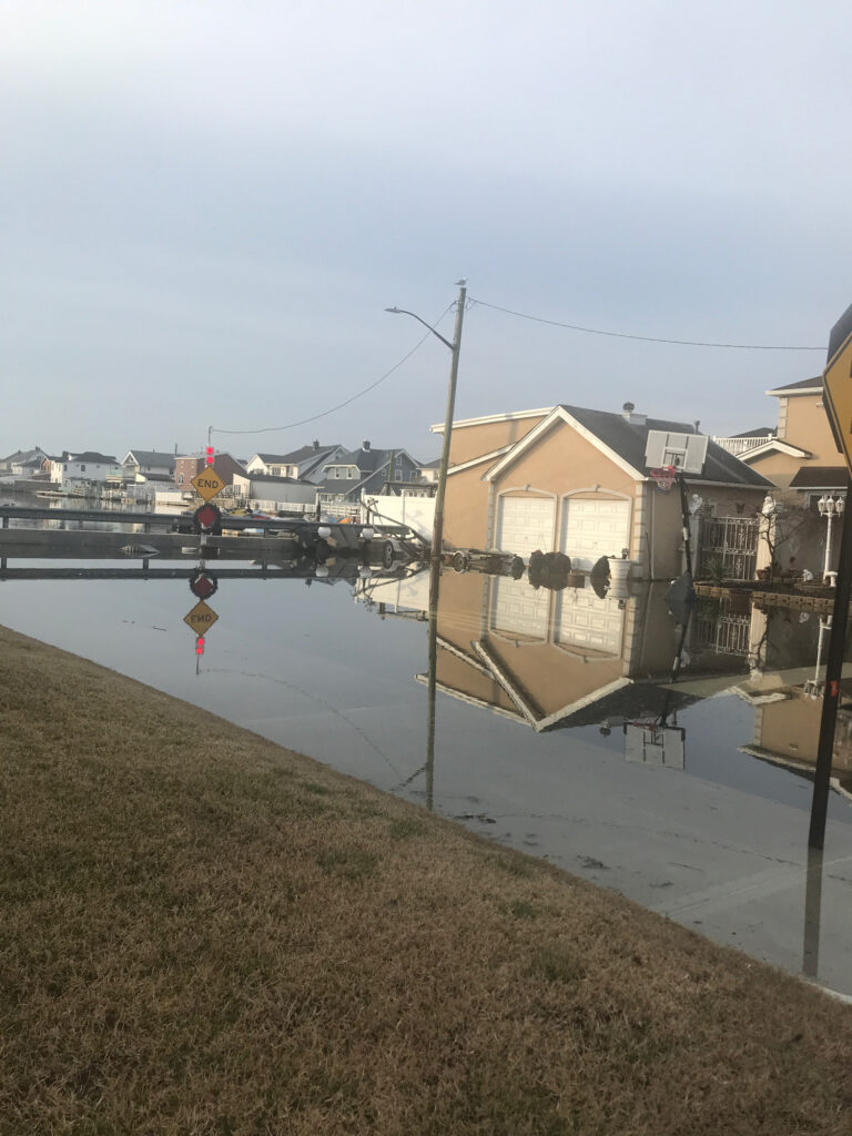 a body of water with buildings along it (MyCoast AI)
