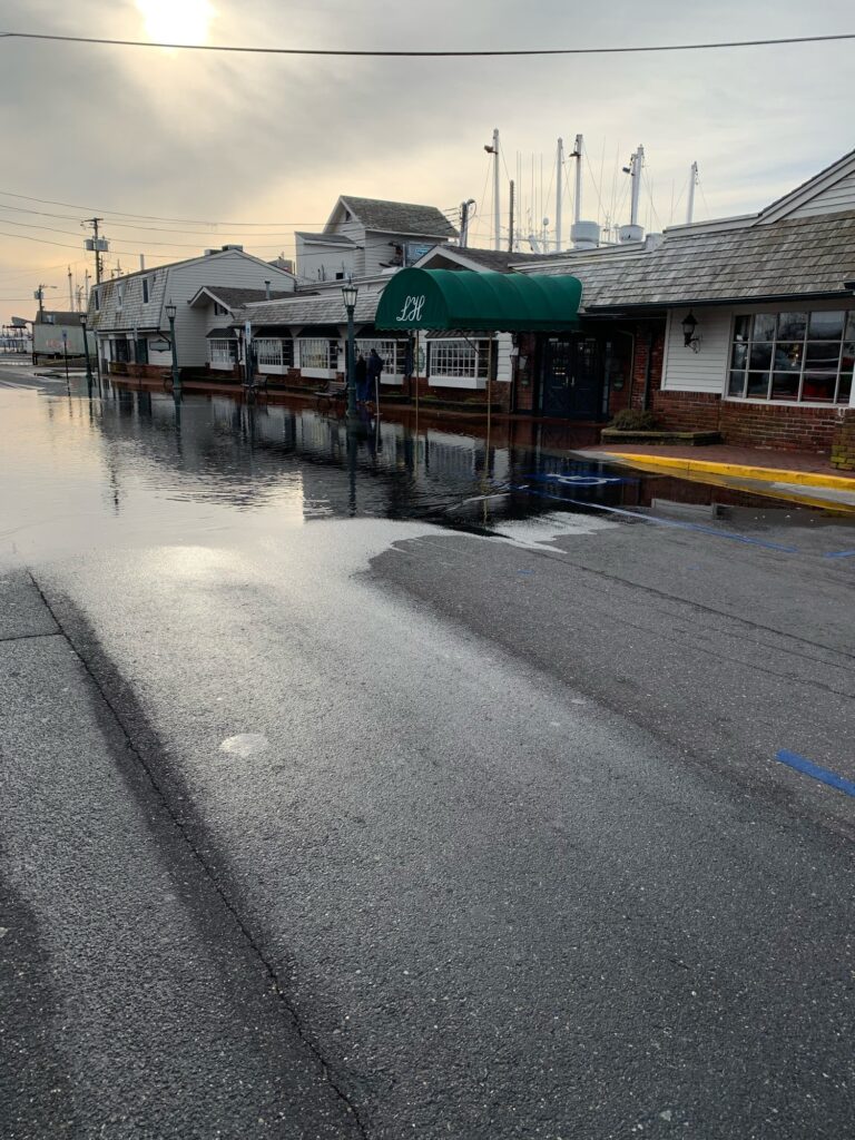 a flooded street with buildings (MyCoast AI)