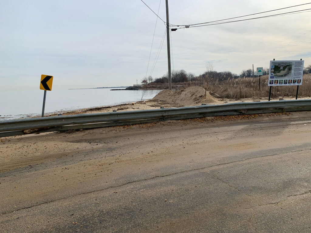 a road with a sign on it (MyCoast AI)