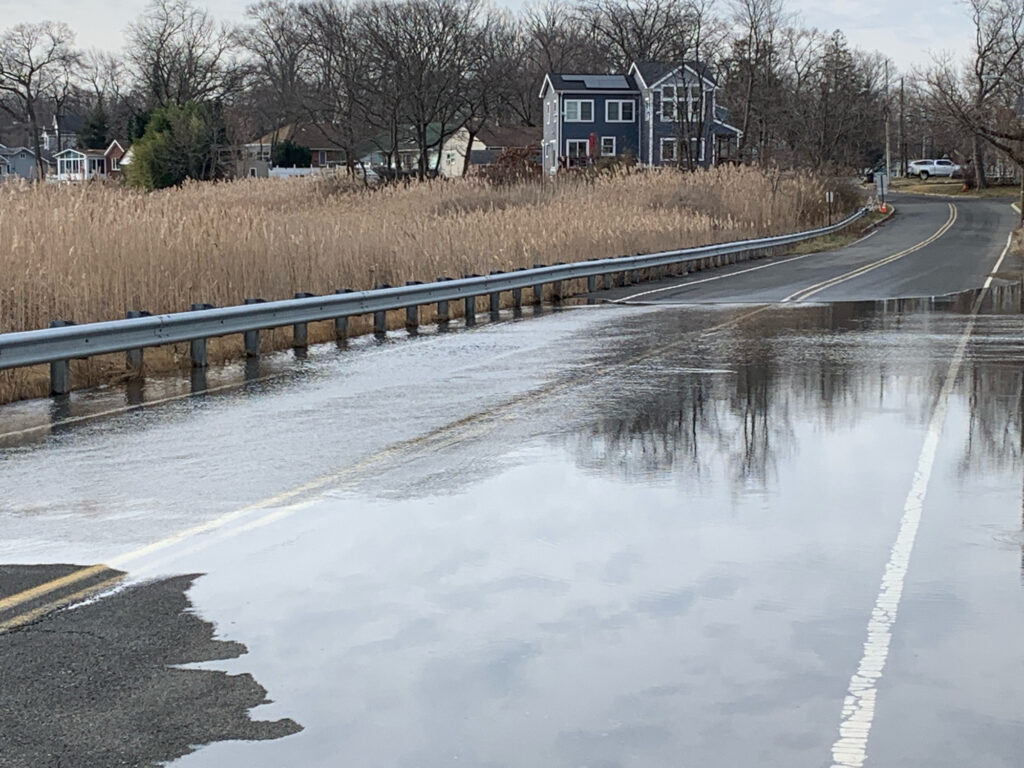 a road with water on the side (MyCoast AI)
