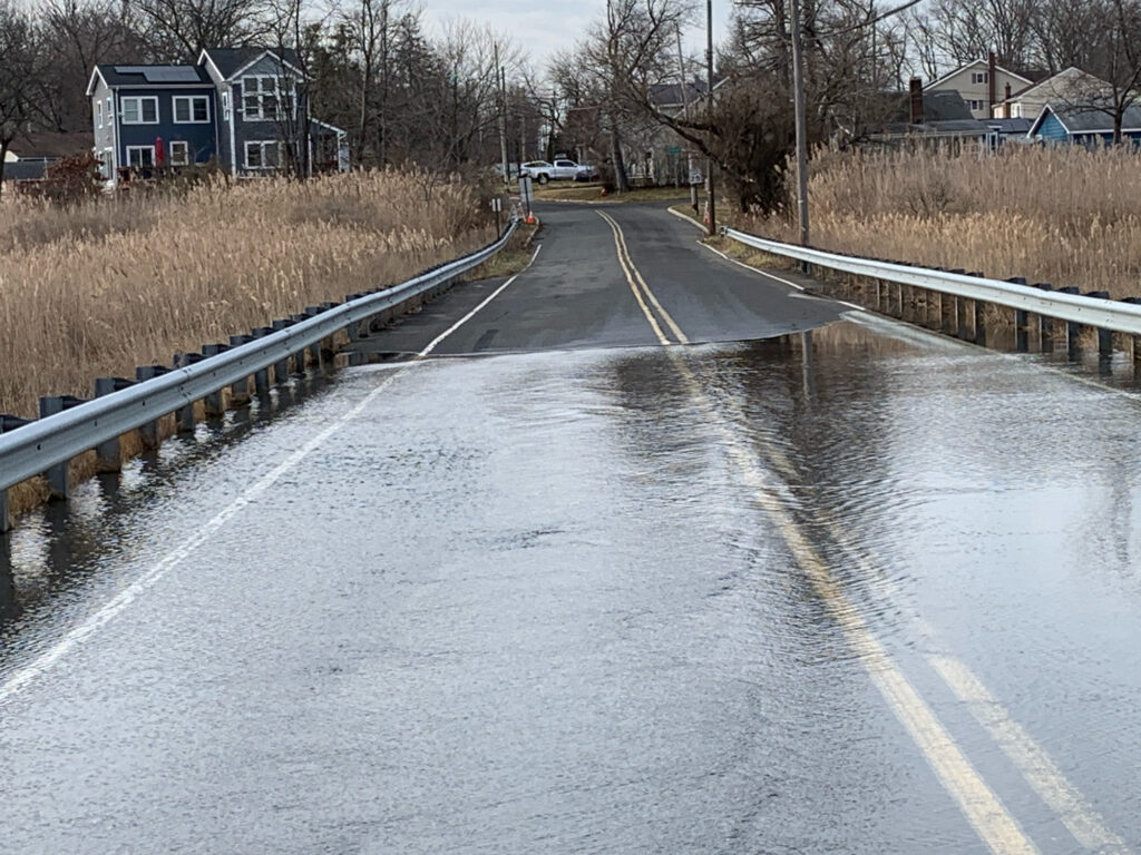 a road with water on the side (MyCoast AI)