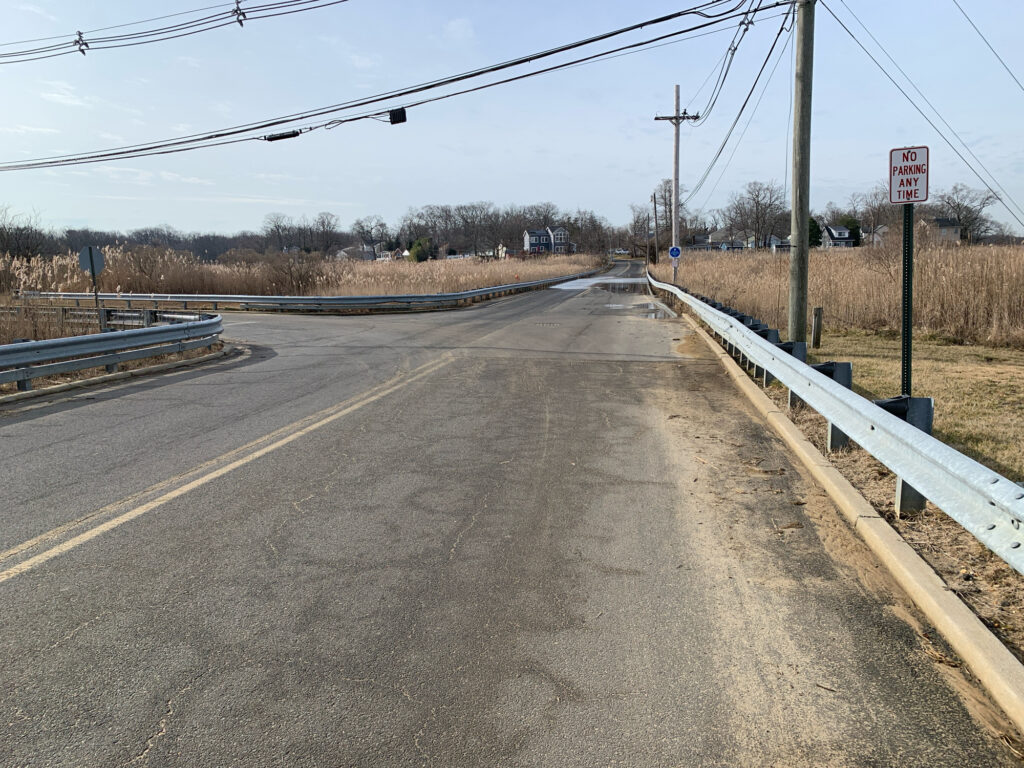 a road with a sign on it (MyCoast AI)