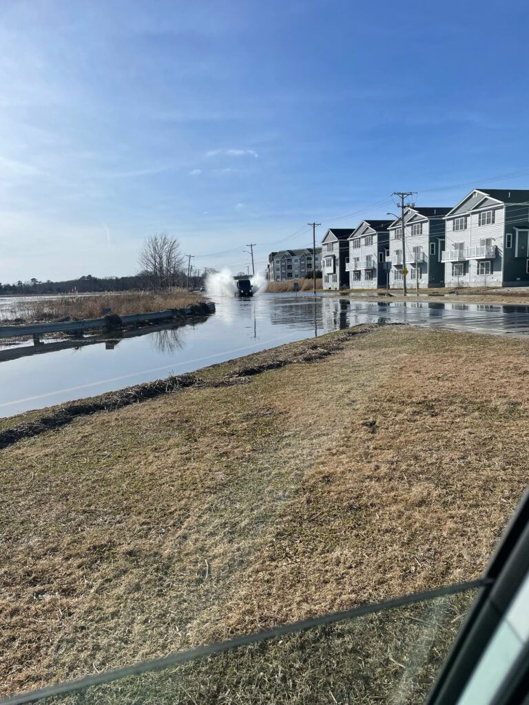 a body of water with buildings along it (MyCoast AI)