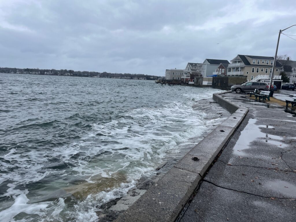 a body of water with waves crashing on it (MyCoast AI)