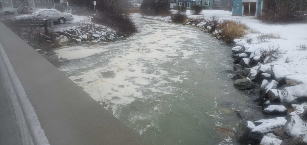 a river with snow on the sides (MyCoast AI)