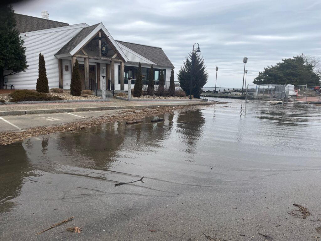 a flooded street with a house (MyCoast AI)