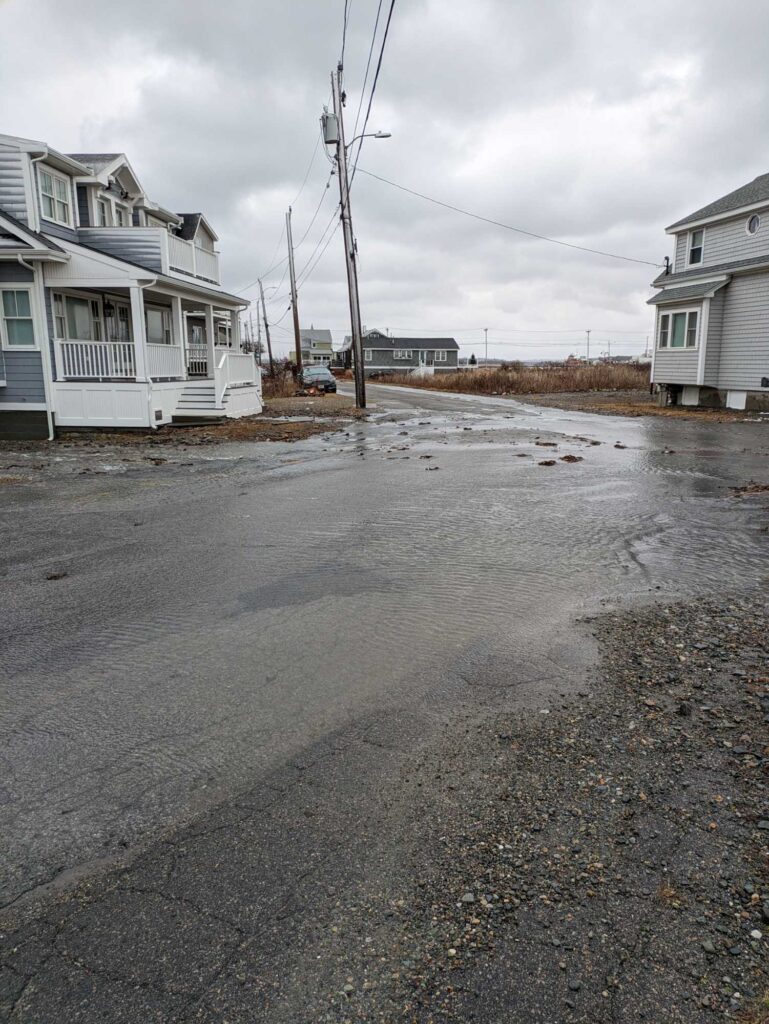a road with houses along it (MyCoast AI)