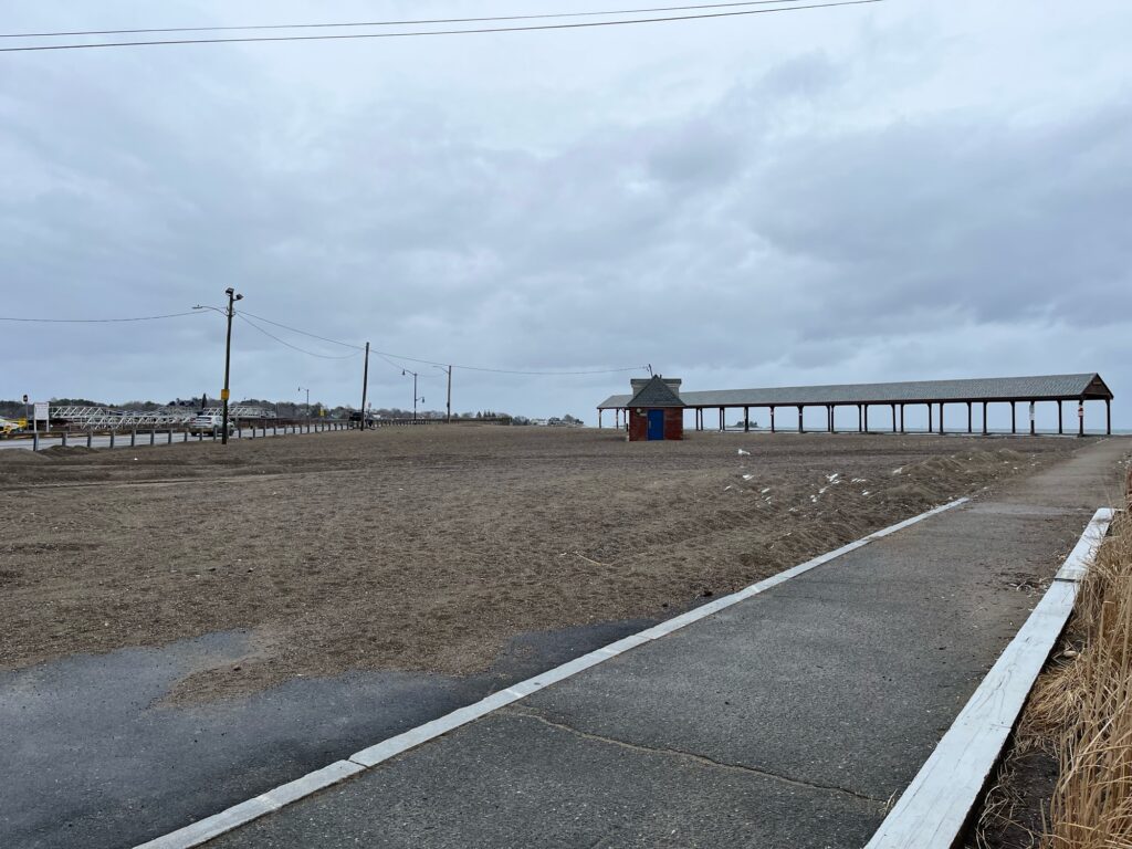 a road with a building on the side (MyCoast AI)