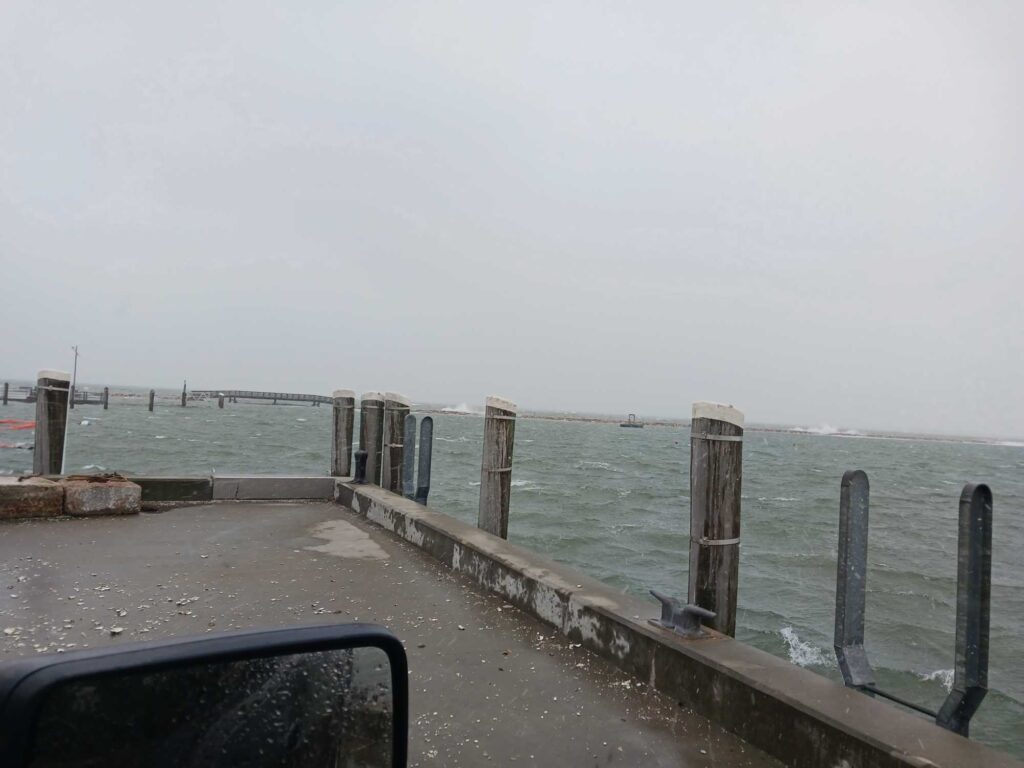 a road next to a body of water (MyCoast AI)