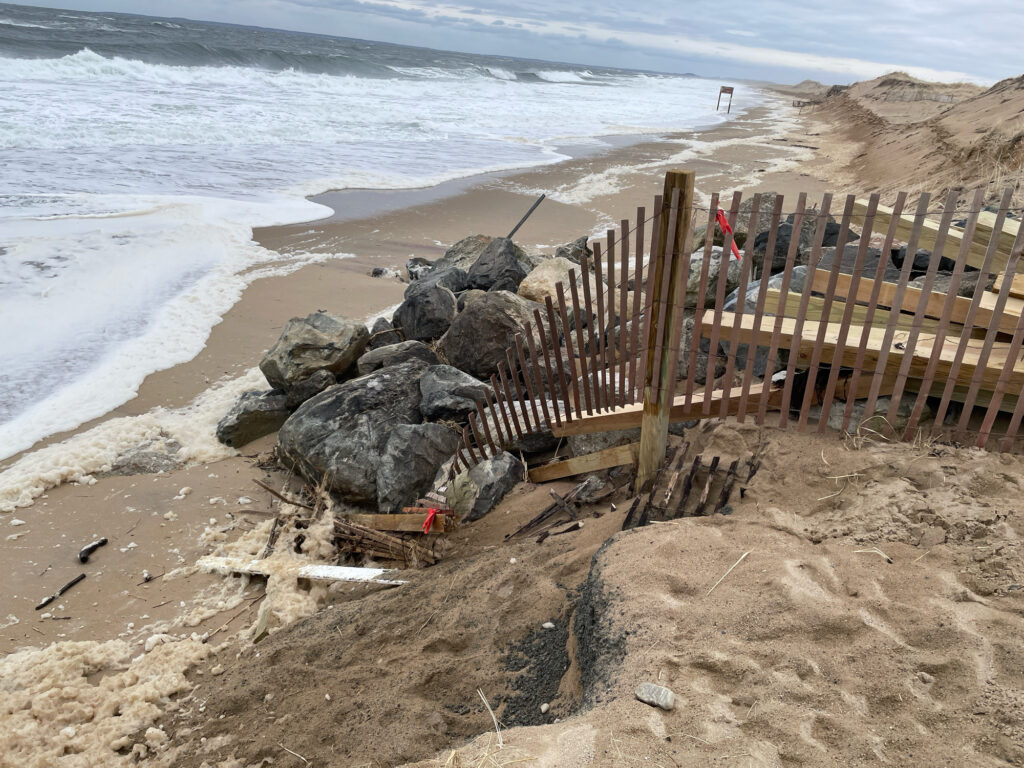 a wooden fence on a beach (MyCoast AI)
