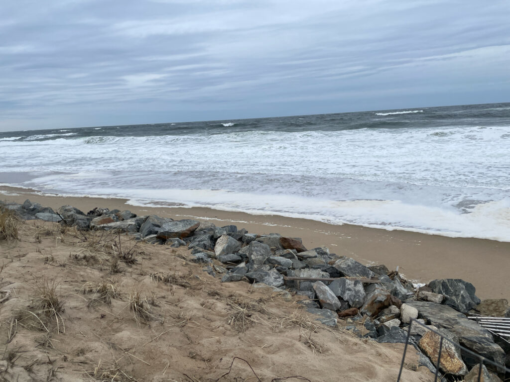 a rocky beach with waves crashing (MyCoast AI)