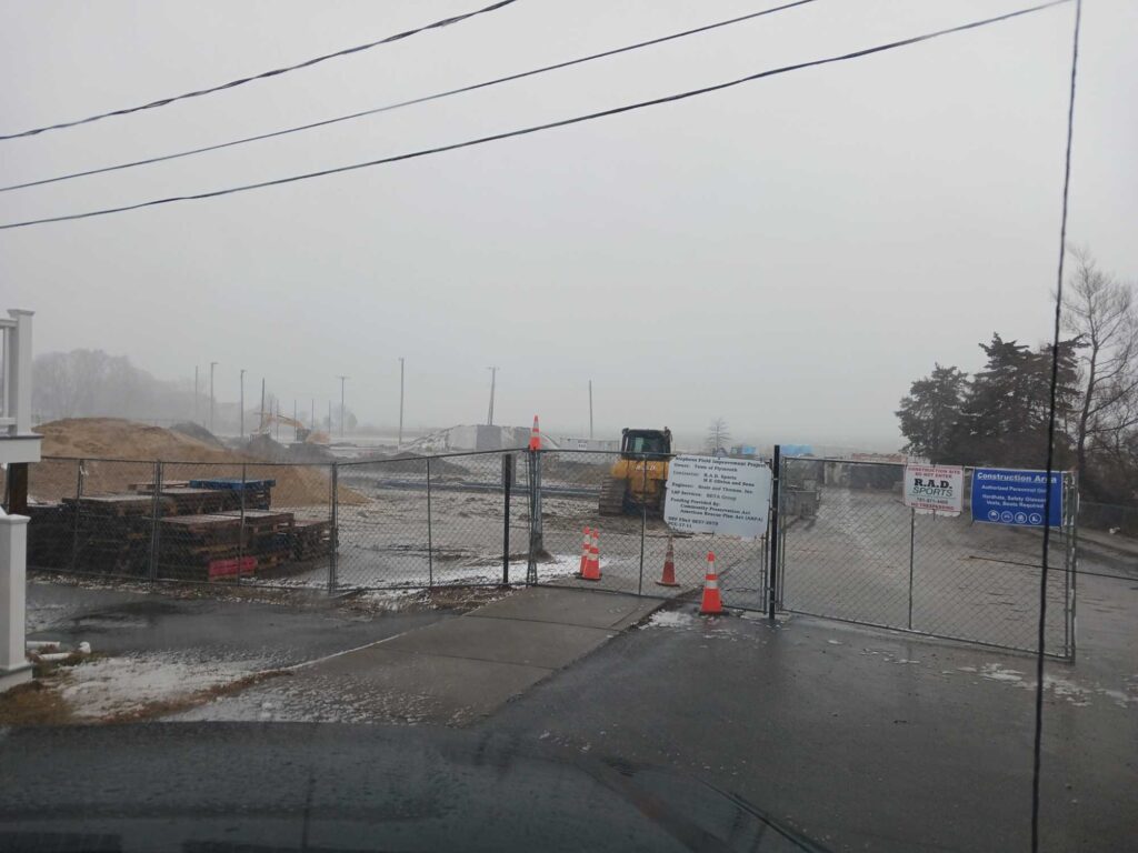 a construction site with a fence (MyCoast AI)
