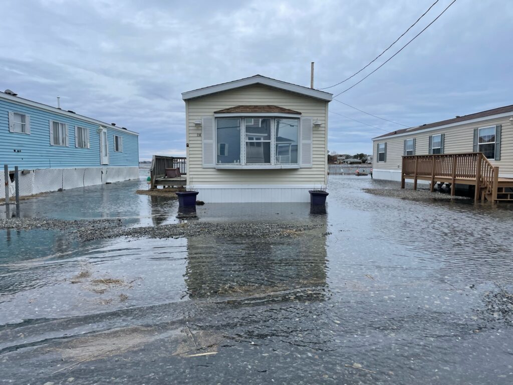a flooded street with buildings (MyCoast AI)
