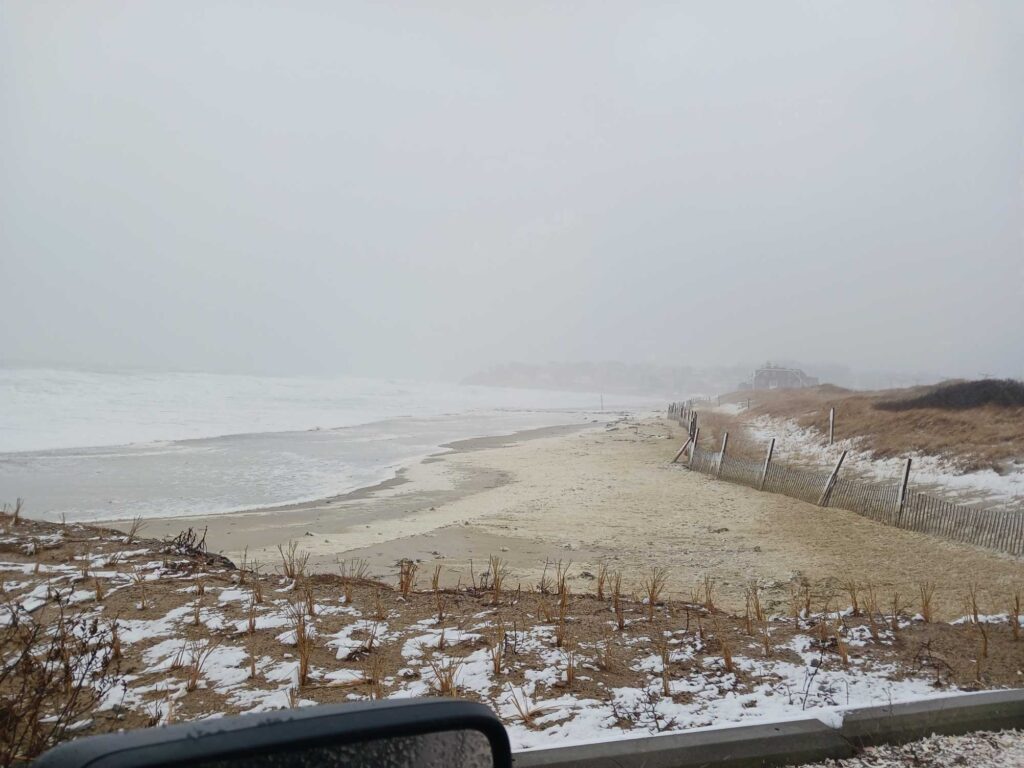 a snowy beach with a fence (MyCoast AI)