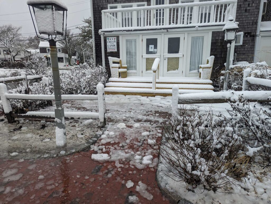 a yard with snow on it (MyCoast AI)