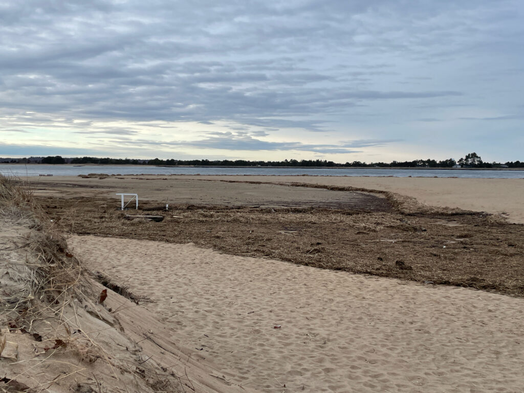 a sandy beach with a bench (MyCoast AI)