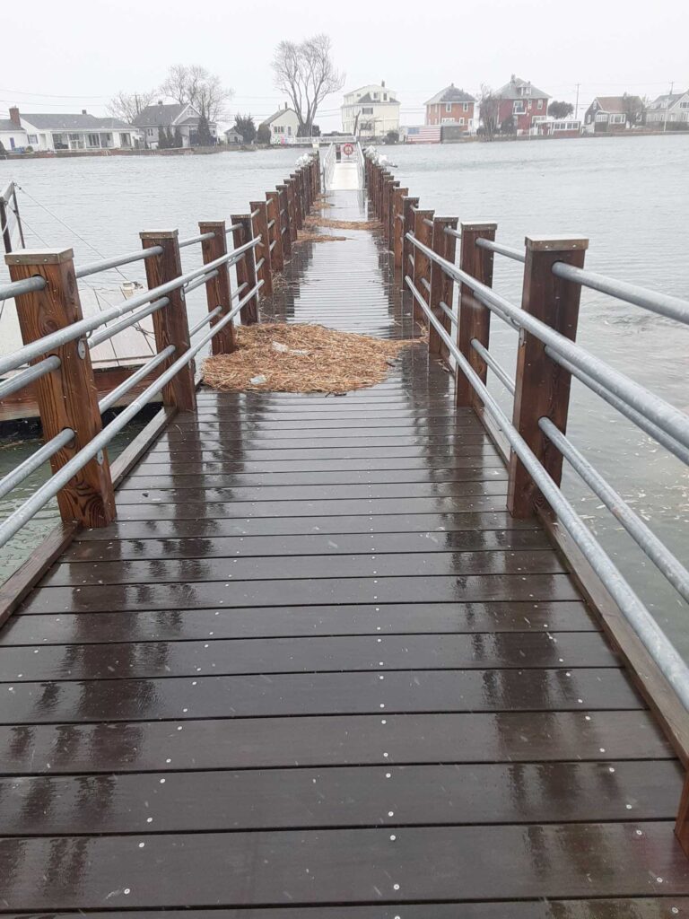 a wooden bridge over water (MyCoast AI)