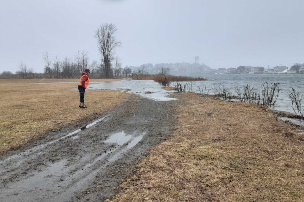 a person standing on a dirt road (MyCoast AI)