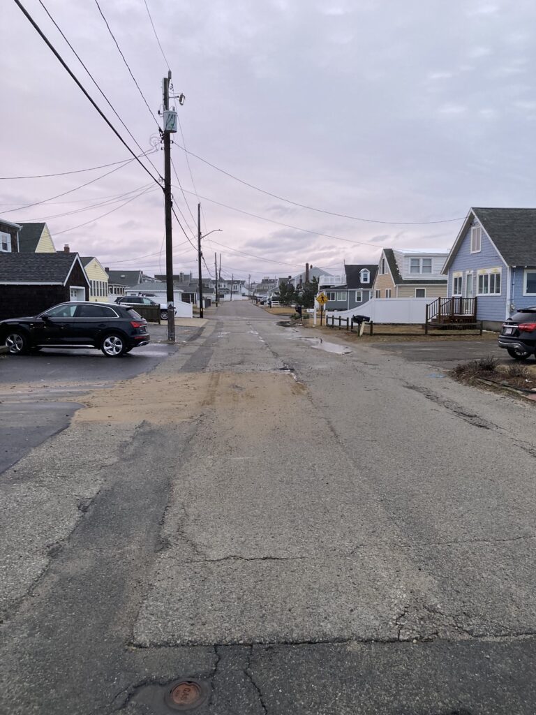 a street with houses and cars (MyCoast AI)