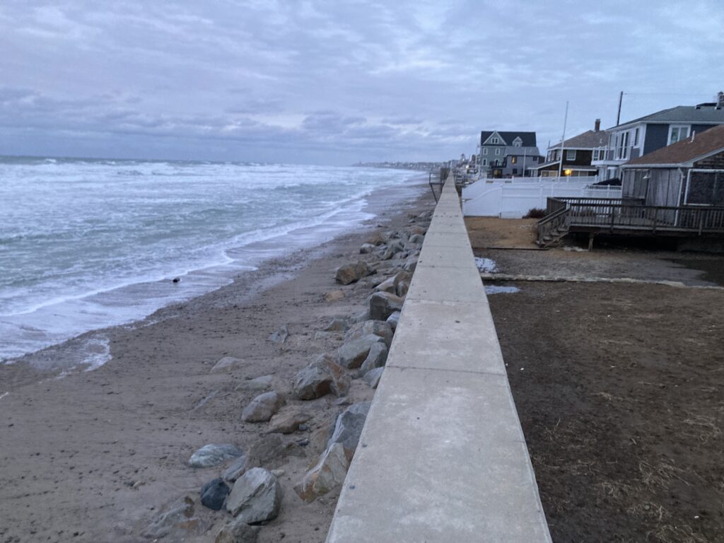 a walkway next to a beach (MyCoast AI)