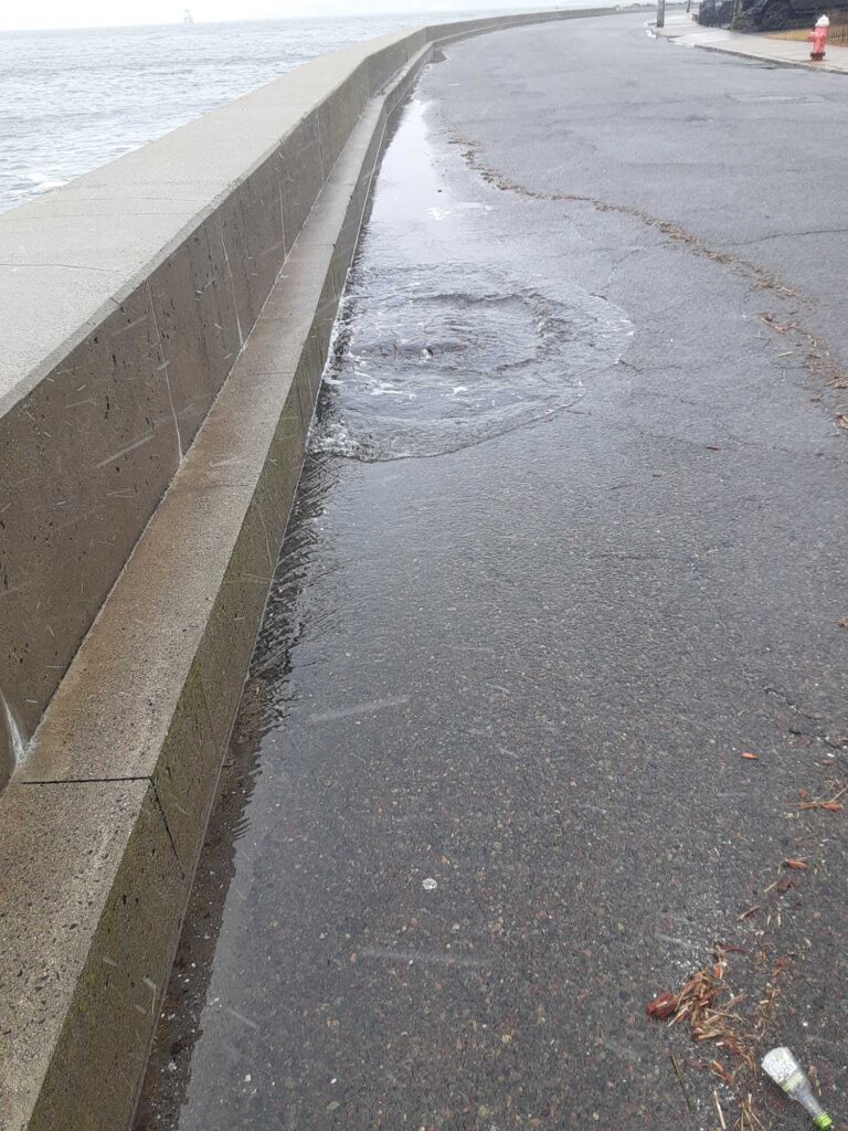 a sidewalk with water on the side (MyCoast AI)
