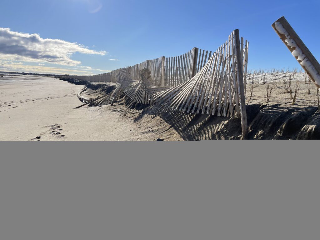 a structure made of wood in the sand (MyCoast AI)
