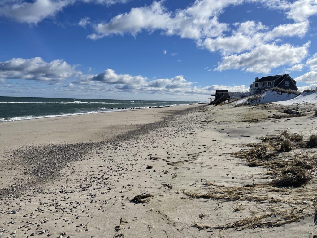 a beach with a house on it (MyCoast AI)