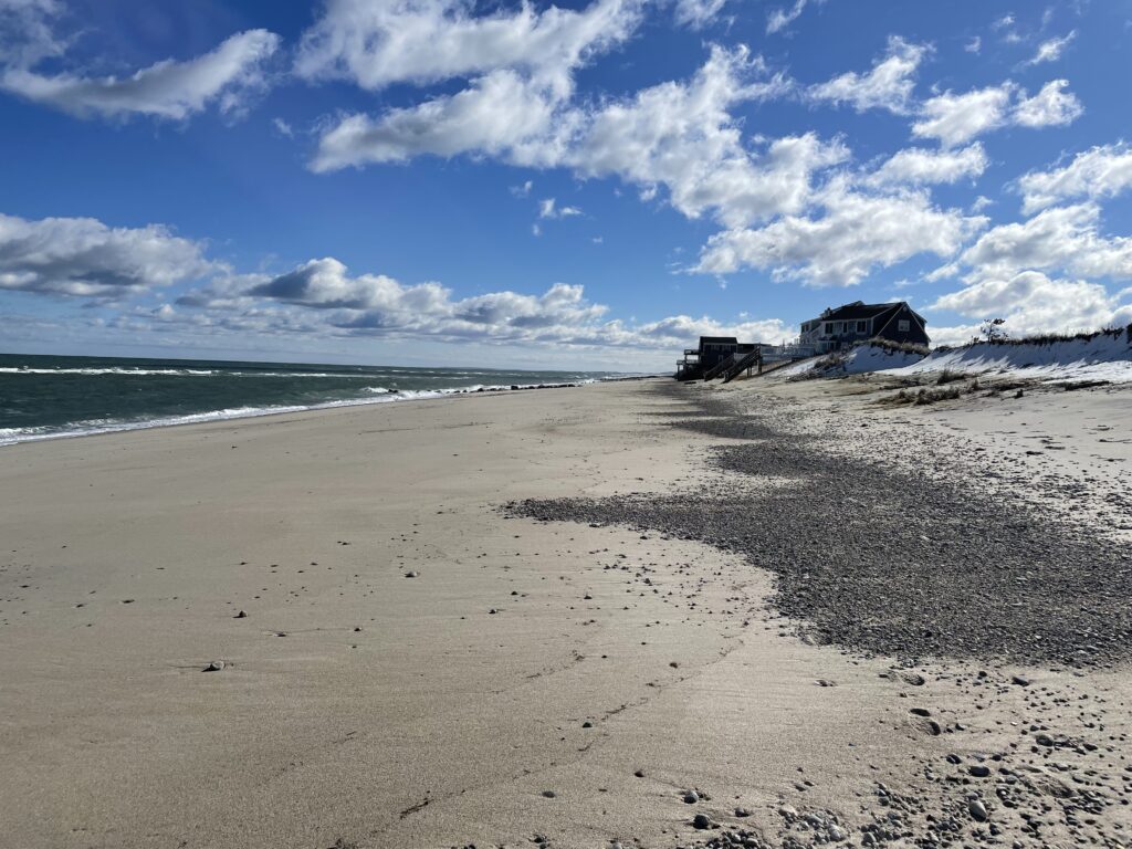 a beach with a boat on it (MyCoast AI)