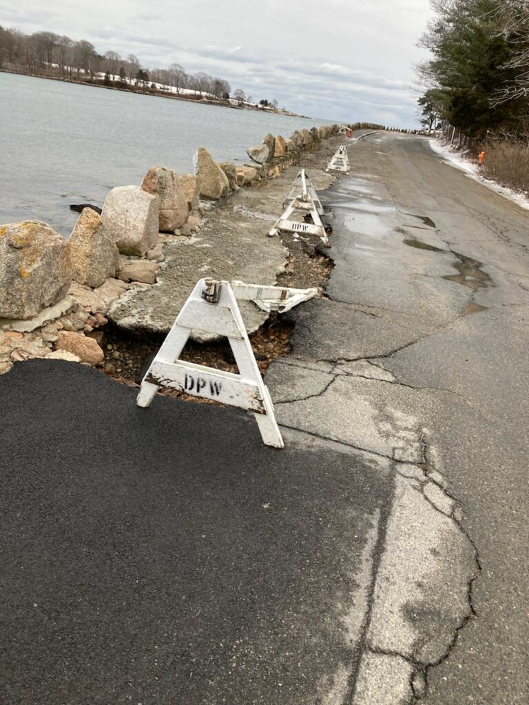 a sign on the side of a road (MyCoast AI)