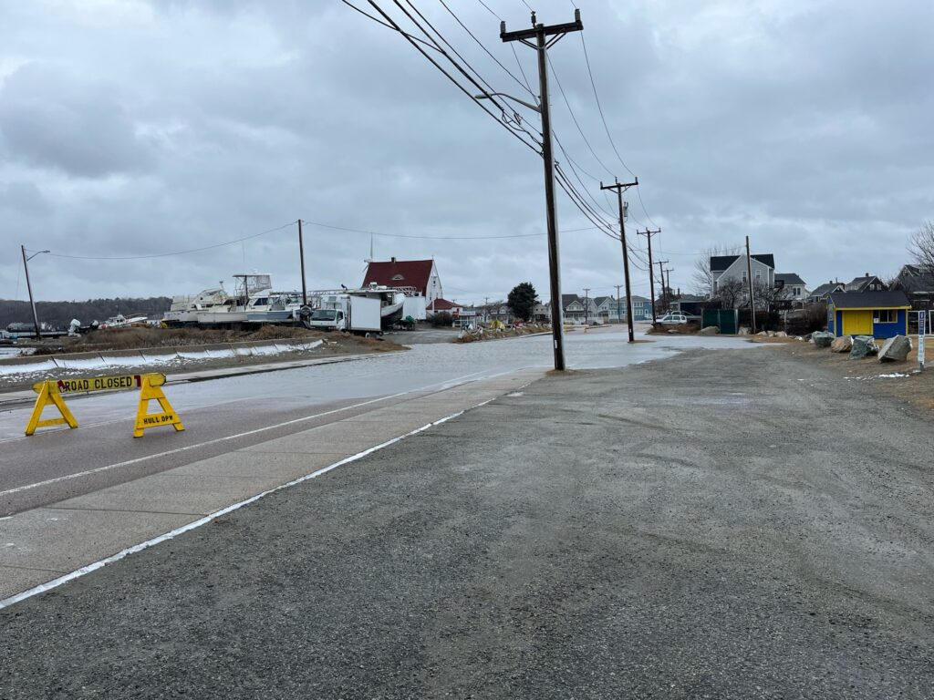 a road with a road and power lines on the side (MyCoast AI)