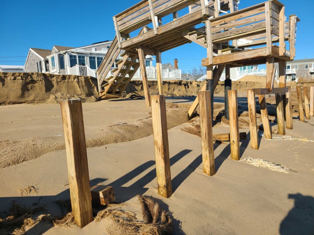 a wooden structure in the sand (MyCoast AI)