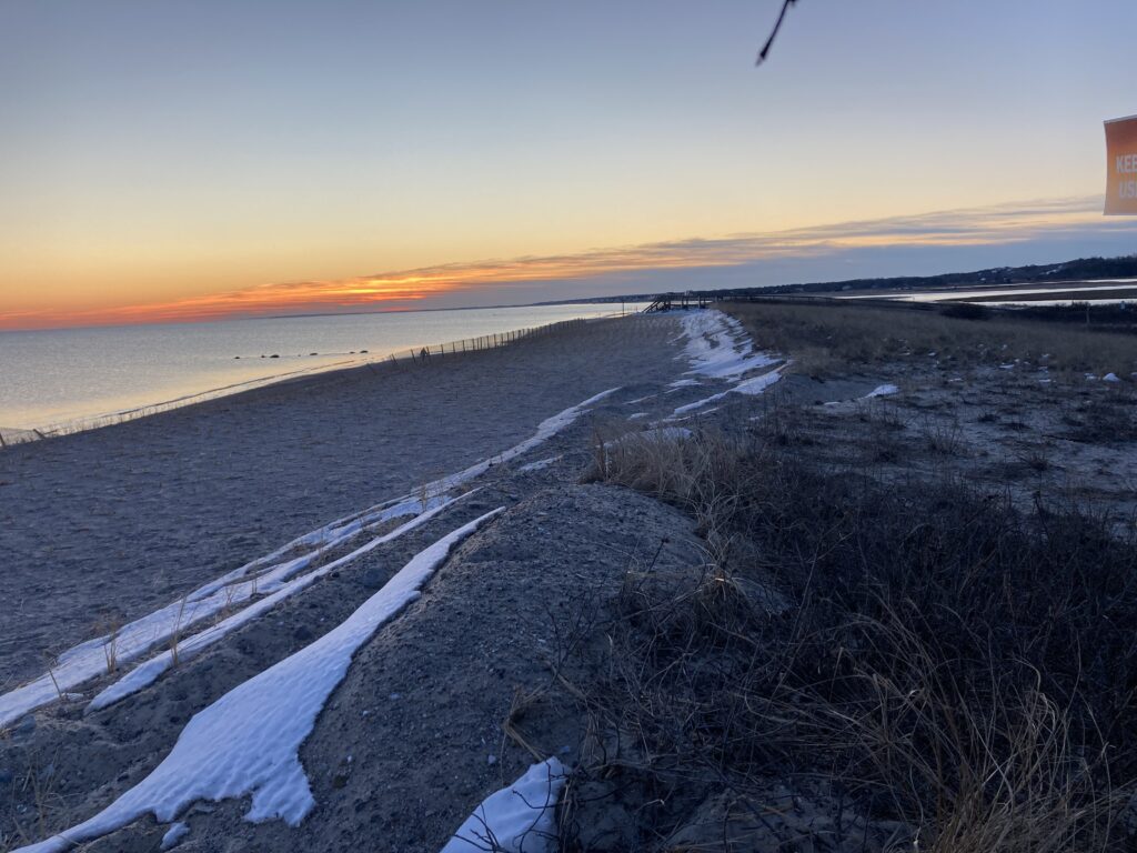 a snowy beach with a sunset (MyCoast AI)
