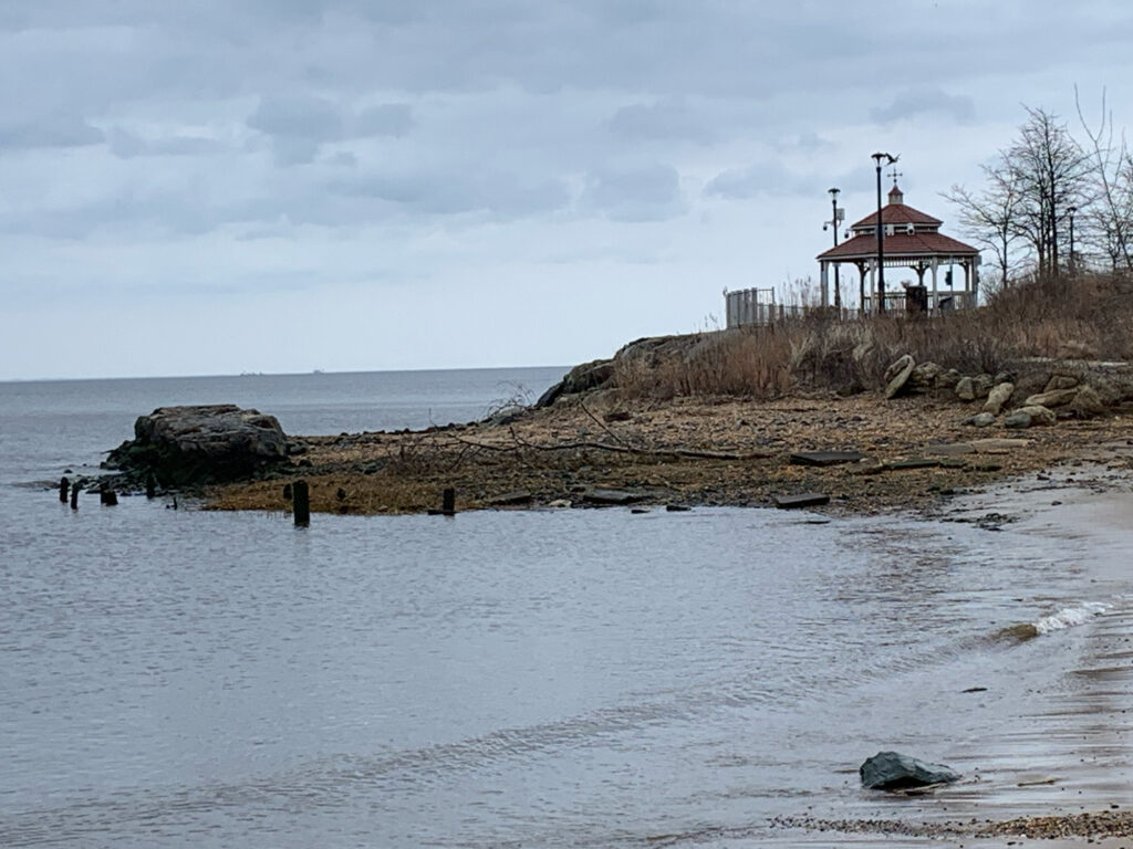 a small building on a rocky shore (MyCoast AI)