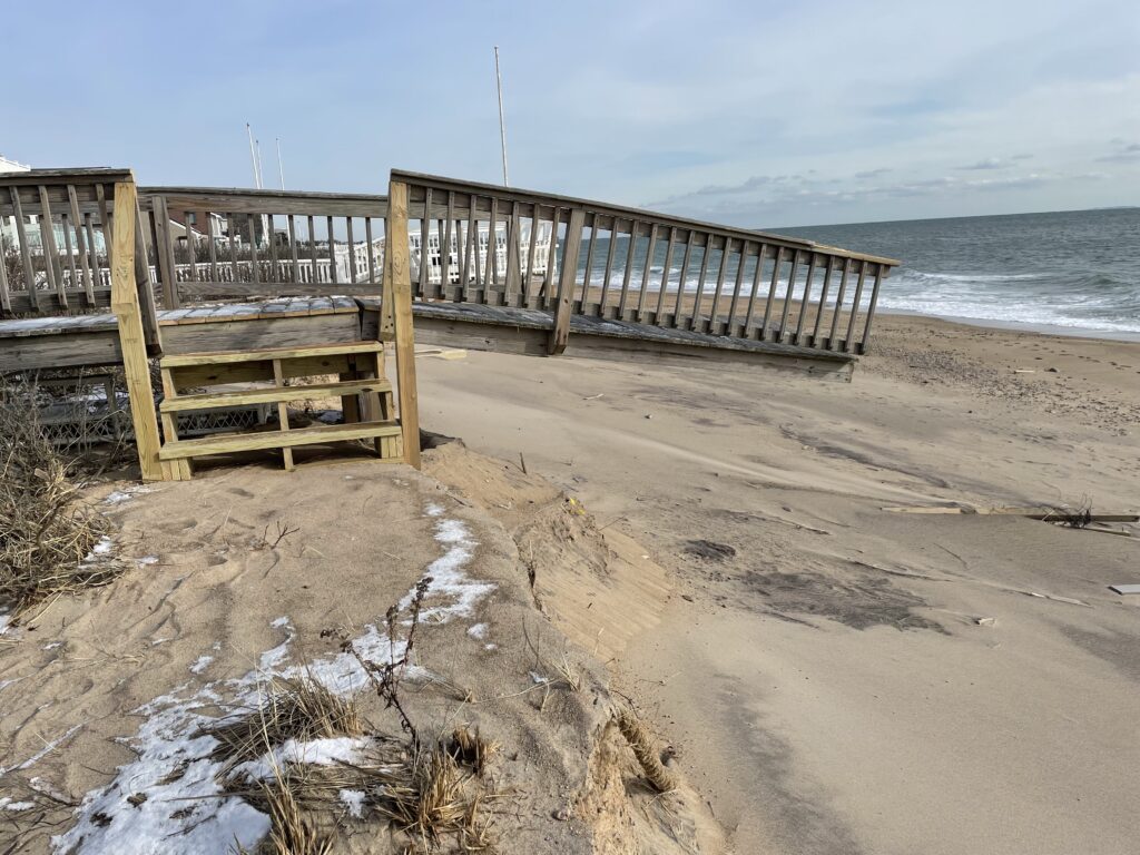a wooden bridge over a beach (MyCoast AI)