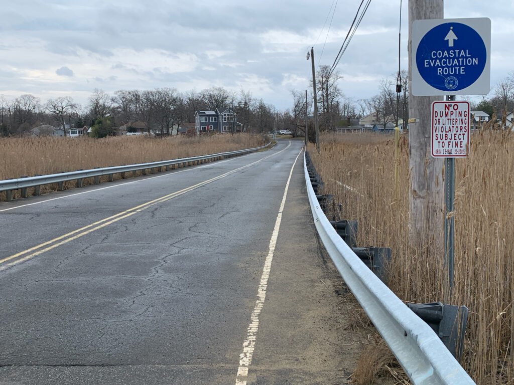 a road with a sign on it (MyCoast AI)