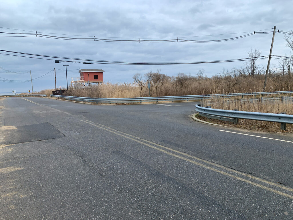 a road with power lines on the side (MyCoast AI)