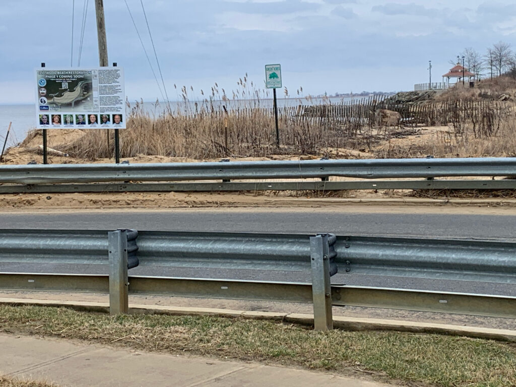 a rail road with a sign on it (MyCoast AI)