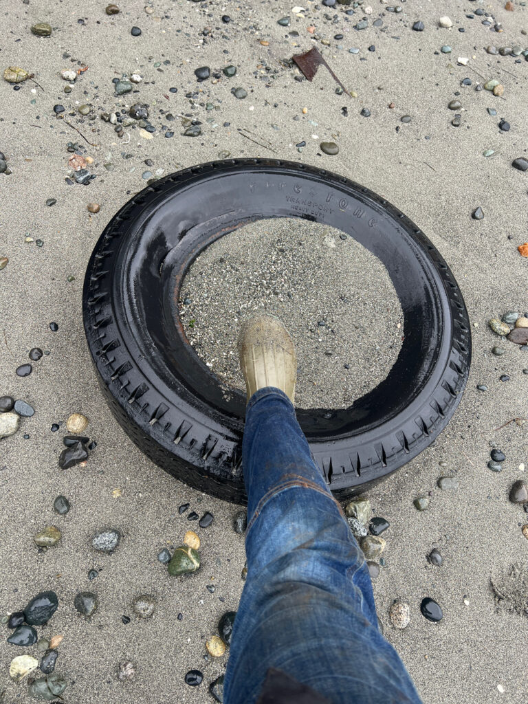 a person holding a bucket (MyCoast AI)