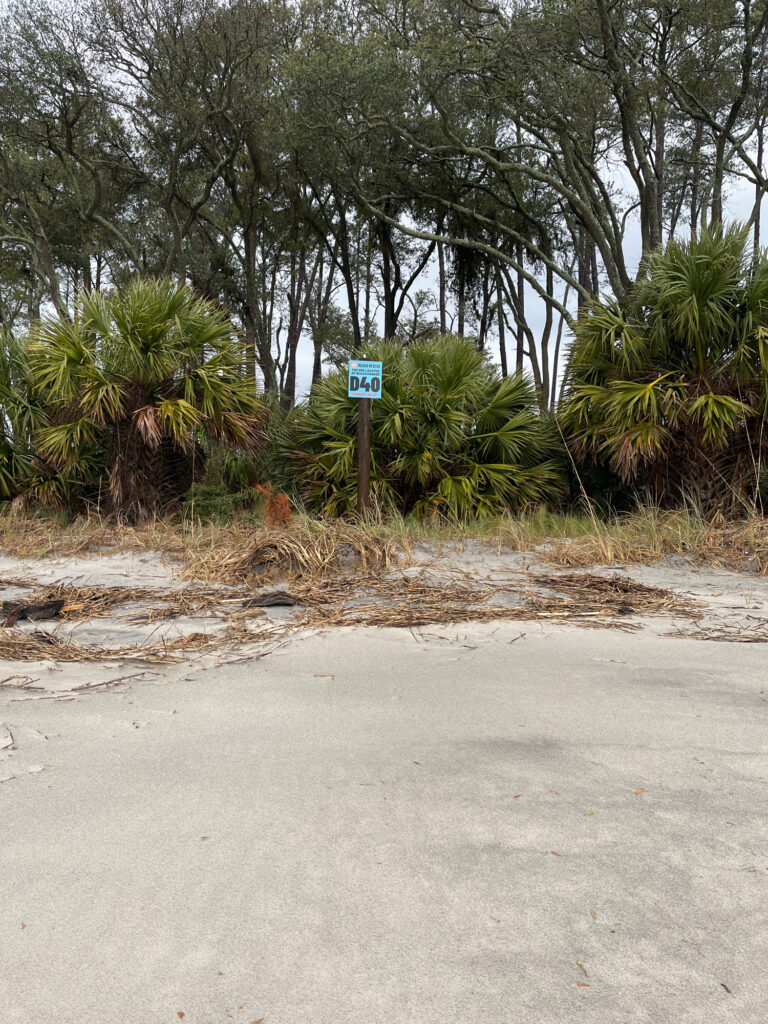 a sign on the side of a road (MyCoast AI)