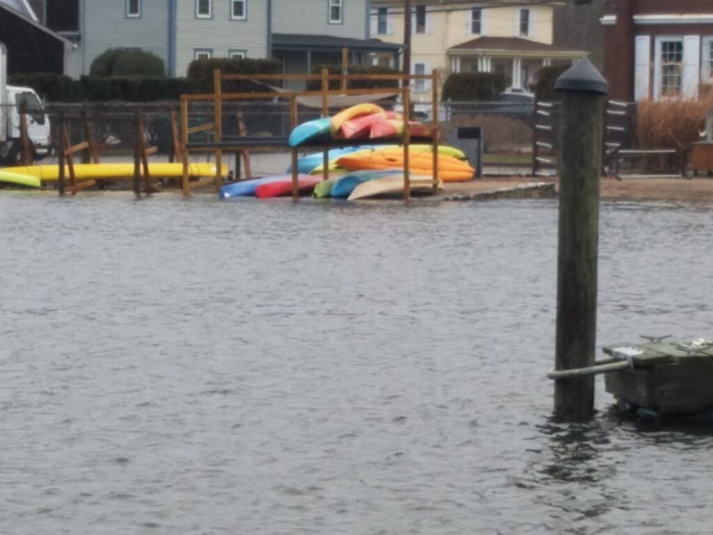a body of water with a playground in the background (MyCoast AI)