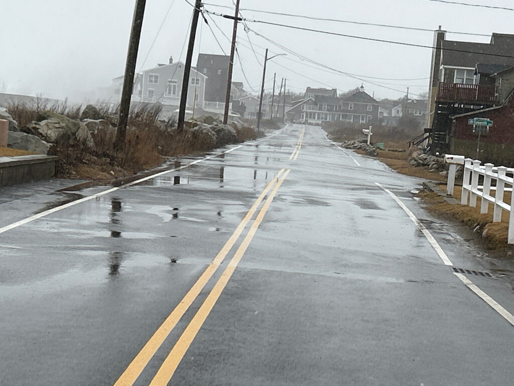 a road with water on the side (MyCoast AI)