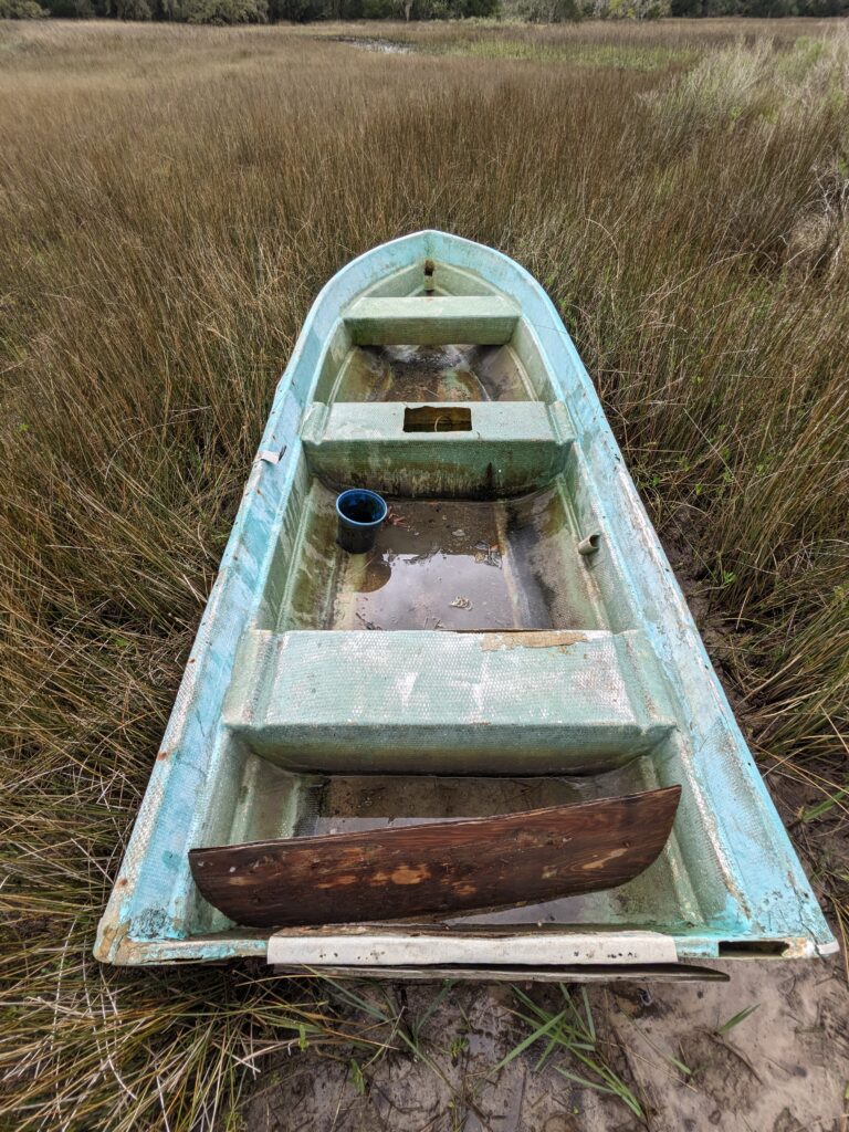 a wooden boat in a field (MyCoast AI)
