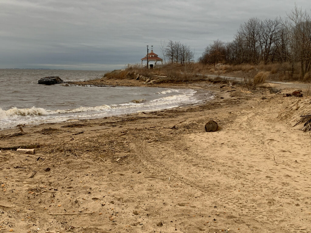 a small building on a beach (MyCoast AI)