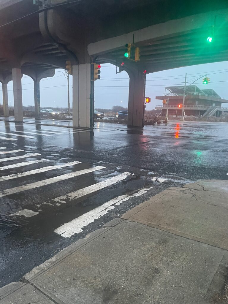 a street with a bridge over it (MyCoast AI)