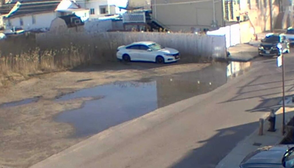a car driving on a road (MyCoast AI)
