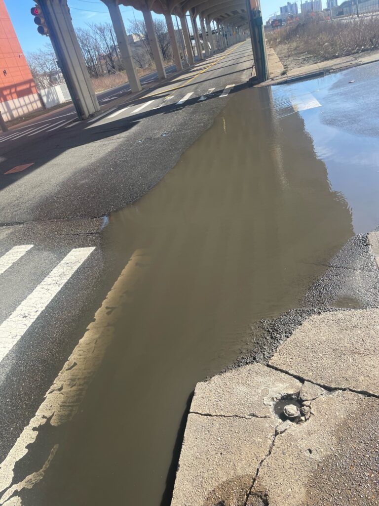a road with water on the side (MyCoast AI)