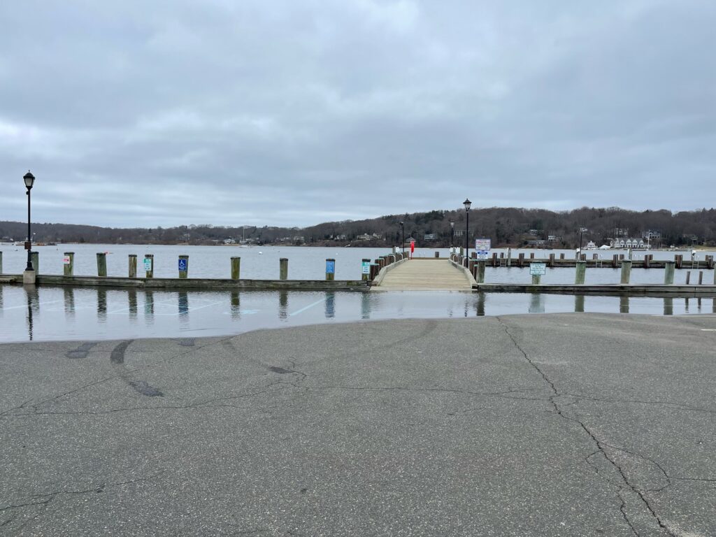 a body of water with a dock and a walkway (MyCoast AI)